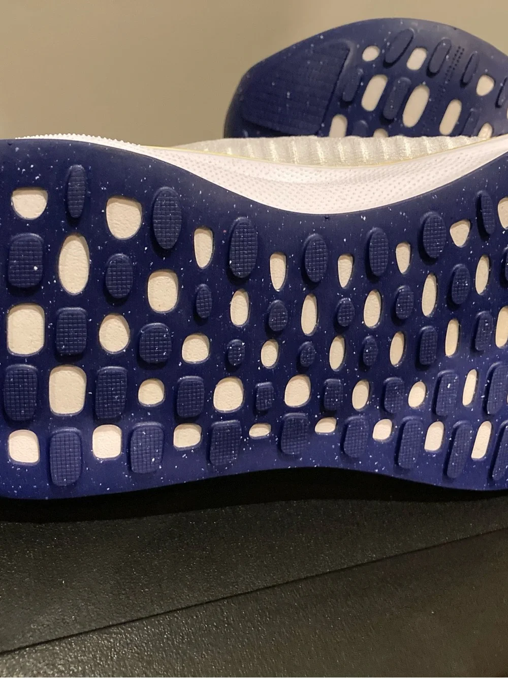 Nike White Athletic Shoes with Blue Swoosh and Yellow Midsole